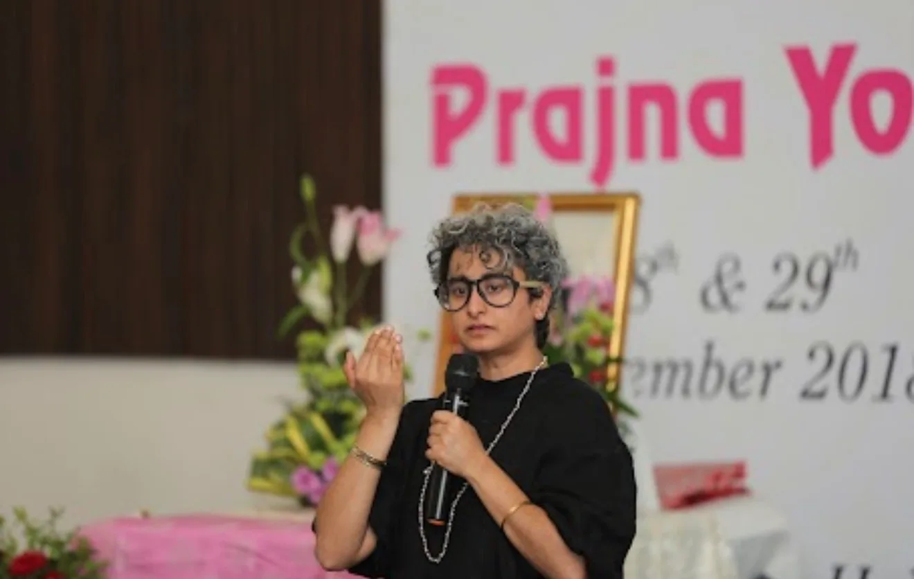 Shreya speaking at a Prajna Yoga programme