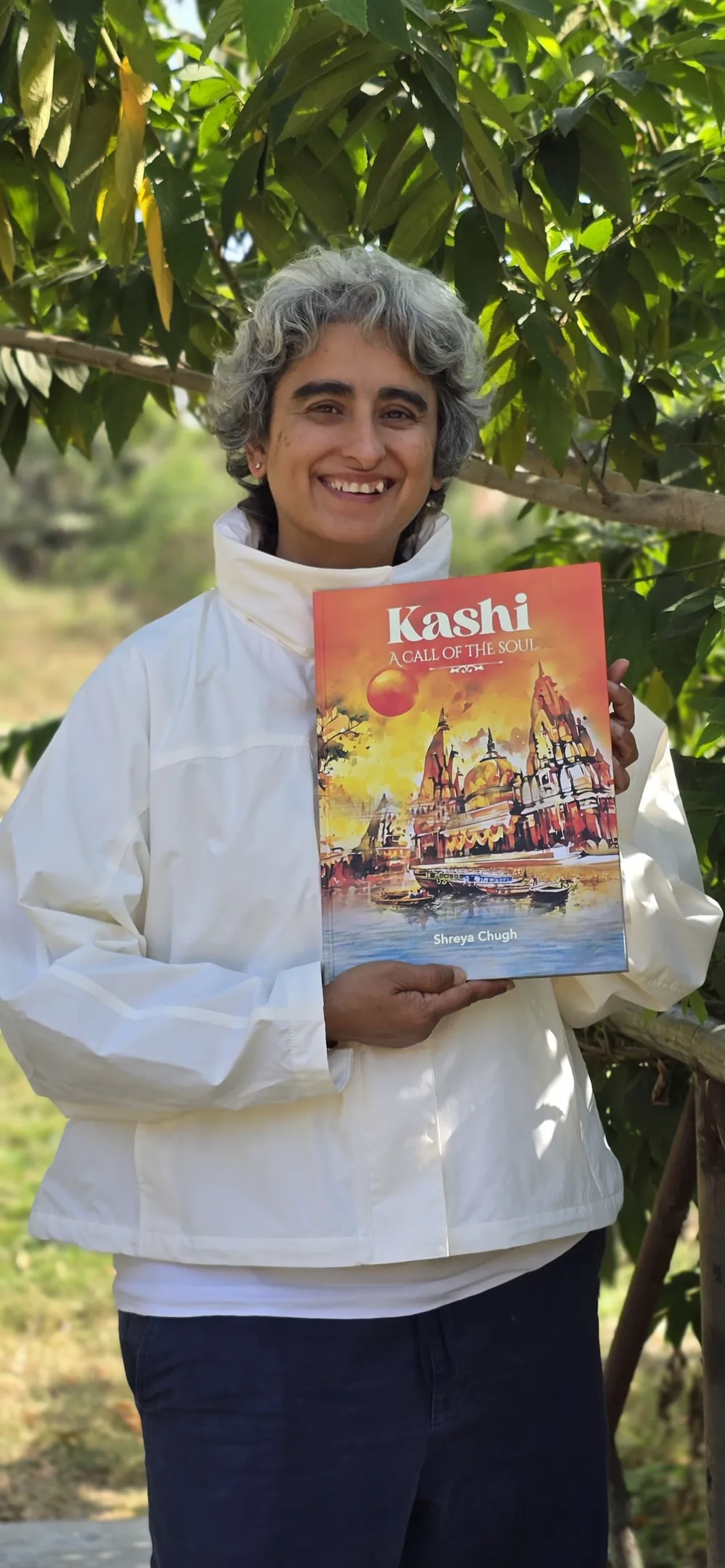 Shreya Chugh holding her book